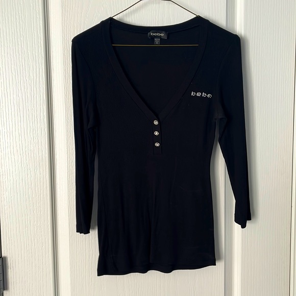 Bebe deep-V with 3/4 sleeve & sparkle button detail. - Picture 1 of 6